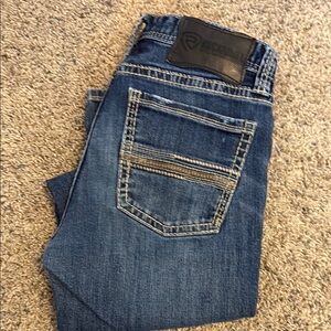 Relaxed Blue Jeans with Natural Fading and Distinctive Stitching